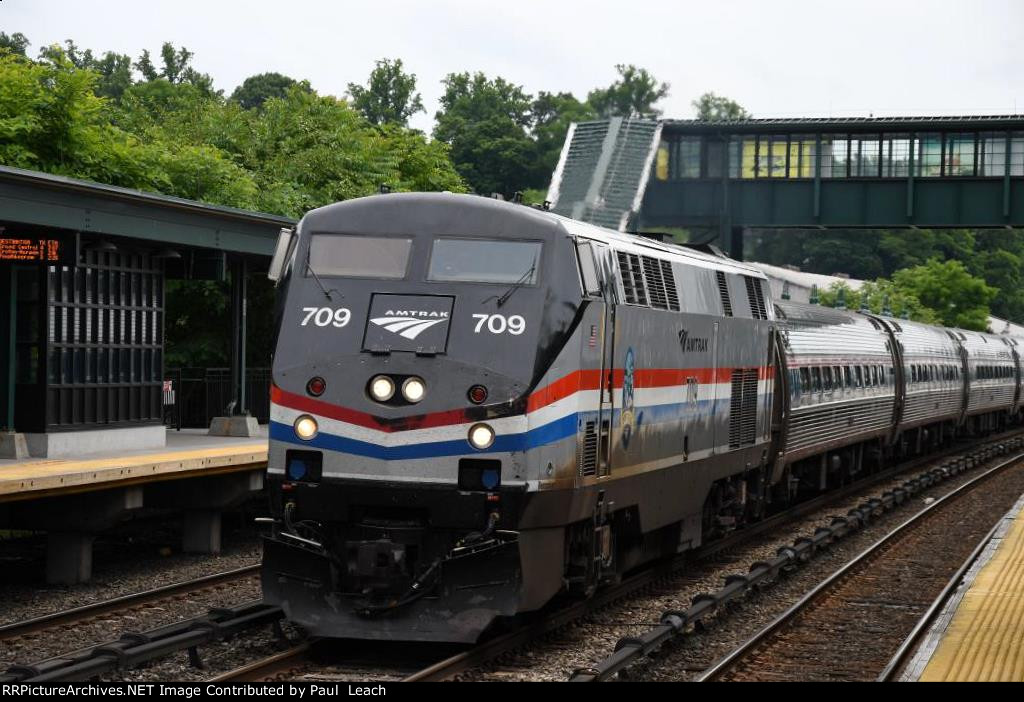 "Empire Service" rolls west through the station